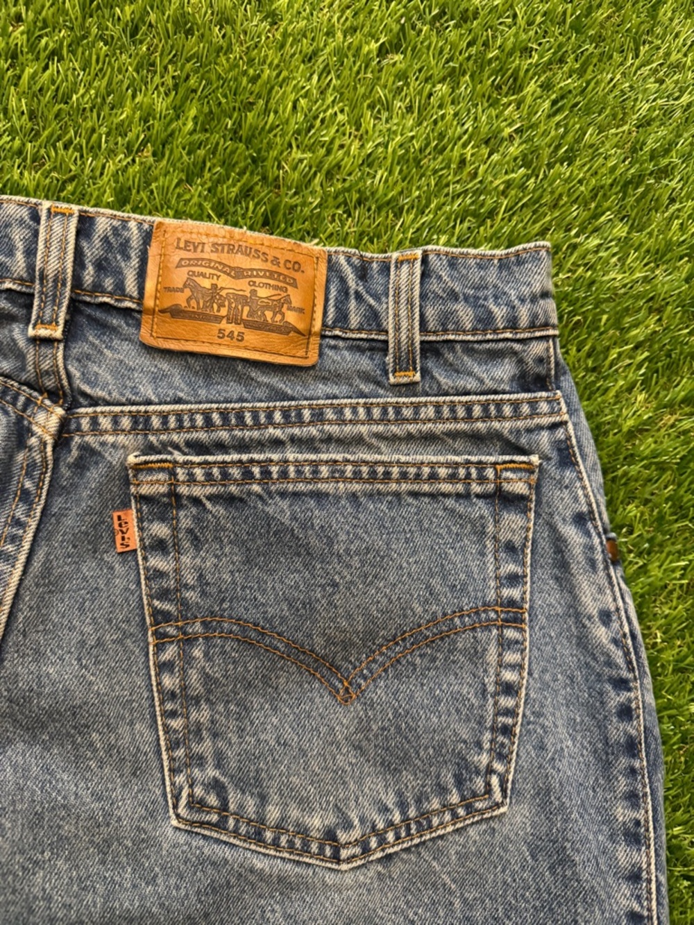 Vintage 1994 Levis 545 loose fit orange tab blue jeans